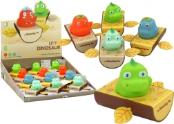 Giocattolo a carica per il bagnetto – dinosauro nella barchetta