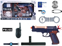Grande set della polizia con pistola, suono e distintivo