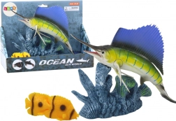 Statuetta di Pesce Spada su Scogliera Corallina con Pesciolini