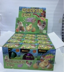 Uovo con pulcino in crescita 6 cm