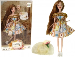 Bambola Emily con cappello autunnale e lunghi capelli castani