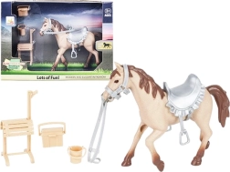 Cavallino nella stalla con accessori per ragazze