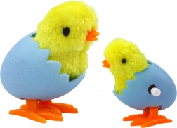 Pulcino a Carica nel Guscio Giallo