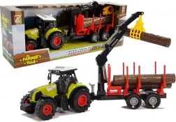 Trattore con rimorchio forestale e legna