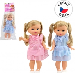 Bambola con trecce e bretelle