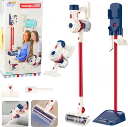 Set da pulizia per bambini con aspirapolvere bianco in piedi