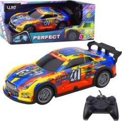 Auto RC da corsa con carrozzeria luminosa blu‑gialla