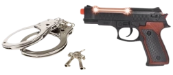 Pistola della polizia con manette