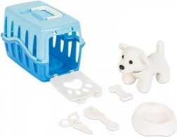 Cagnolino in scatola di trasporto blu