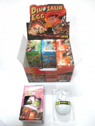 Uovo con dinosauro crescente 12x8 cm