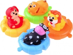 Animaletti di gomma su puzzle galleggianti