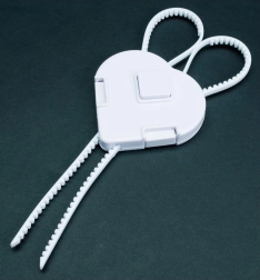 Fermo di sicurezza flessibile per ante per bambini