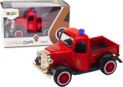 Camion dei pompieri classico 1:36 con trazione, luci e suoni rosso