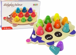 Riccio in legno – giocattolo educativo con 10 piolini colorati