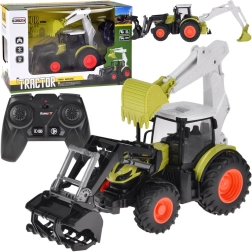 Trattore telecomandato con escavatore e caricatore