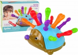 riccio gioco di inserimento blu con aculei colorati