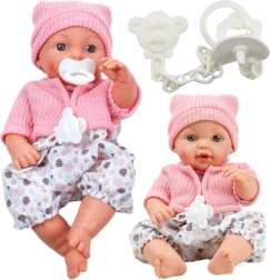 Bambola di stoffa con cuffietta e suoni