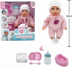bambola 35 cm beve e fa la pipì Tosia con accessori