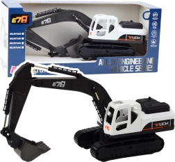 Grande escavatore a cingoli con benna in metallo e giunti mobili