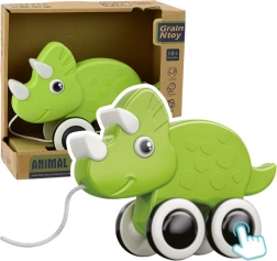 Dinosauro verde da trainare con fischietto