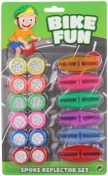 Colorati accessori in plastica per bicicletta – set di catarifrangenti e dischetti decorativi