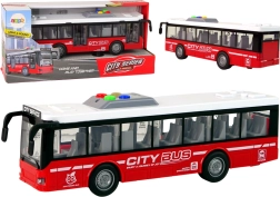Autobus a batteria con trazione a frizione, luci e suoni 1:16 – Rosso