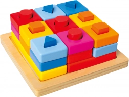 Bino forme ad incastro colorate su tavola