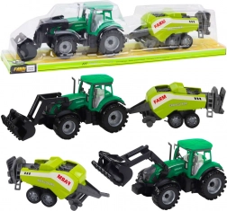 Trattore verde con caricatore e pressa per balle compatibile