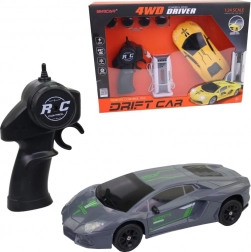 Auto elettrico telecomandato con ruote intercambiabili e funzione di drifting