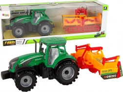 Trattore verde con coltivatore arancione – set a inerzia per bambini