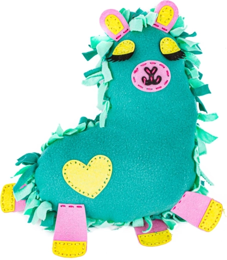 Lama di peluche finito come cuscino