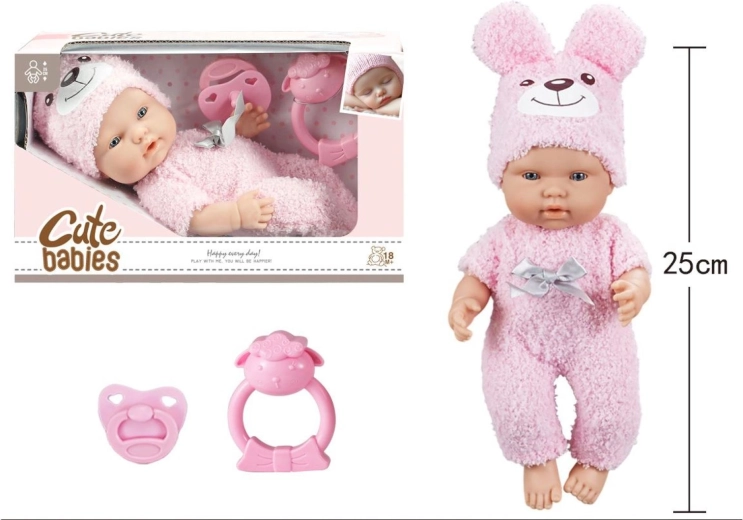 Bambolina con ciuccio e sonaglio in tutina rosa