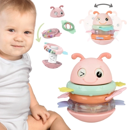 Giocattolo sensoriale per bambini Woopie ape 2 in 1 con sonaglio e massaggiagengive rosa
