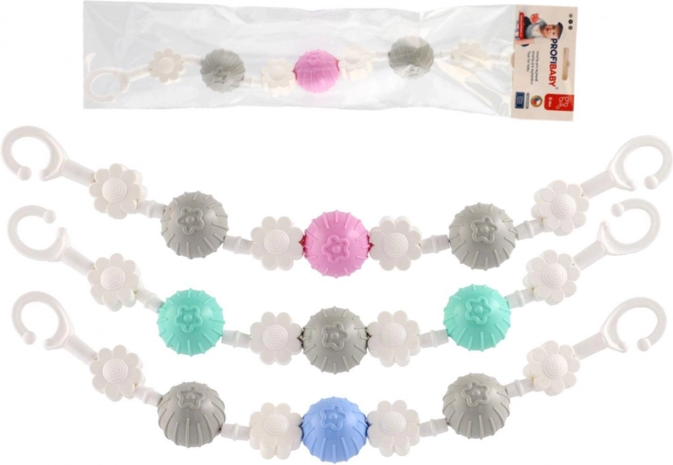 Giocattolo sospeso per passeggino con fiorellini e palline