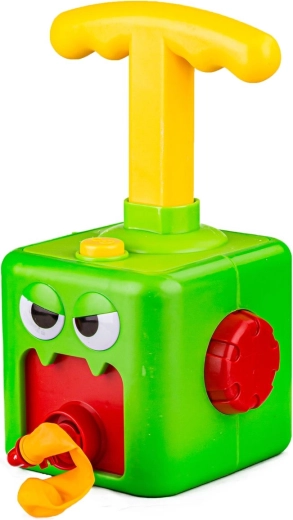 Design giocoso del mostriciattolo verde e palloncini “dalla bocca”