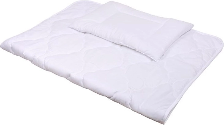 Coperta e cuscino confortevoli con trapuntatura