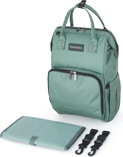 Mani libere grazie al fissaggio al passeggino e alla cinghia per valigia