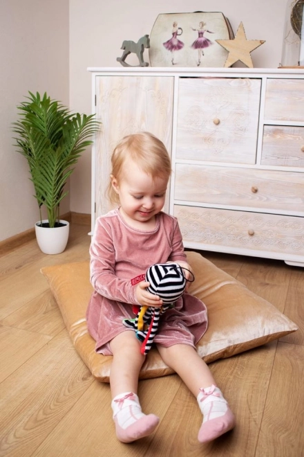 Laccetto per un facile fissaggio a passeggino o lettino