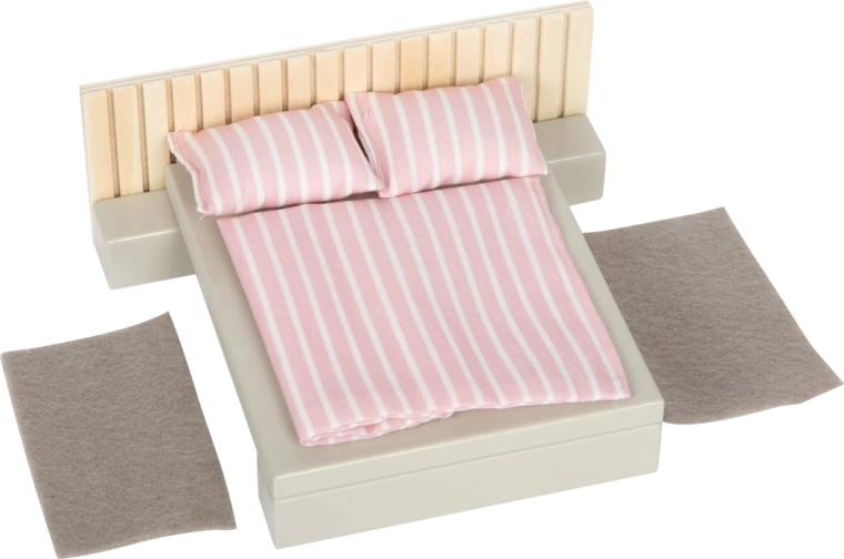 Accogliente camera da letto con biancheria in tessuto