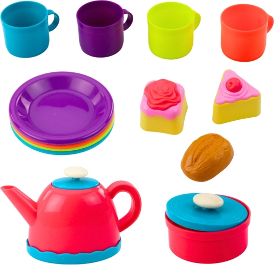 Stoviglie colorate e dolcetti per una fantasia giocosa