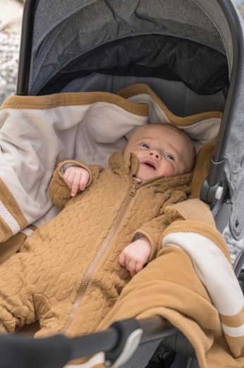 Protezione per il mento e cappuccio per un comfort extra