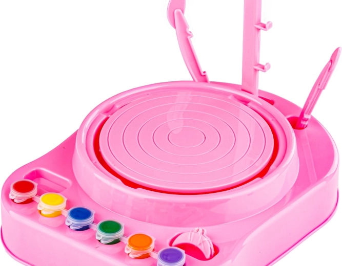 Tornio da vasaio rosa con piattaforma girevole