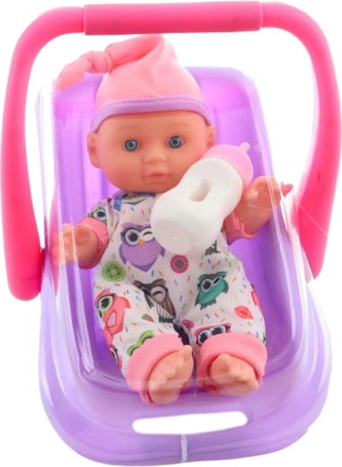 Biberon e tenero abitino con gufetti