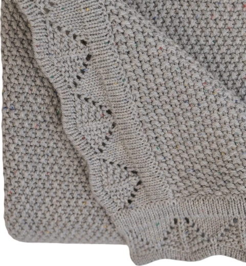 Lavorata a maglia in 100% cotone per un comfort tutto l’anno