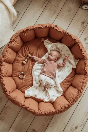 3 in 1: nido, coperta gioco e spazio contenitore