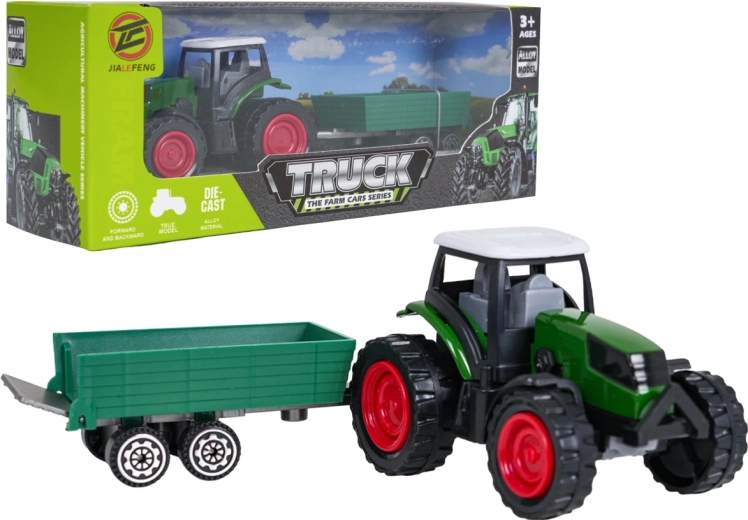 Trattore verde con rimorchio