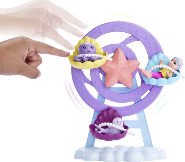 Giostrina girevole con seggiolini a conchiglia