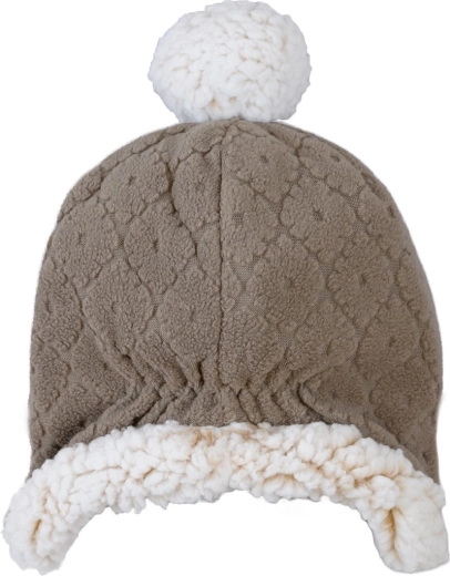 Pompon elegante e look folkloristico