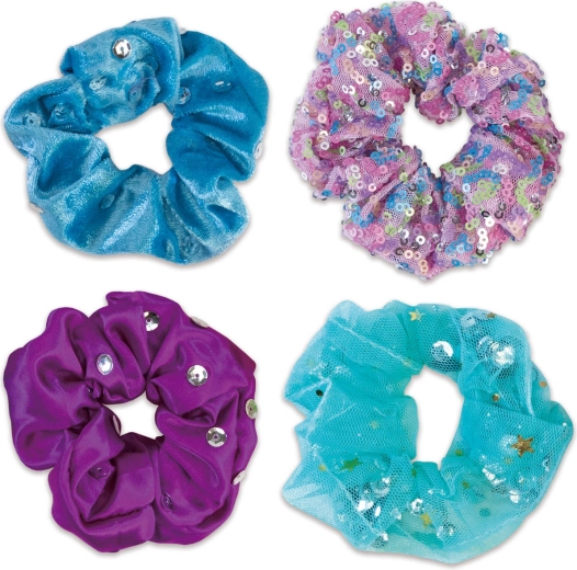 Decorazione scintillante: paillettes, pon-pon e colla