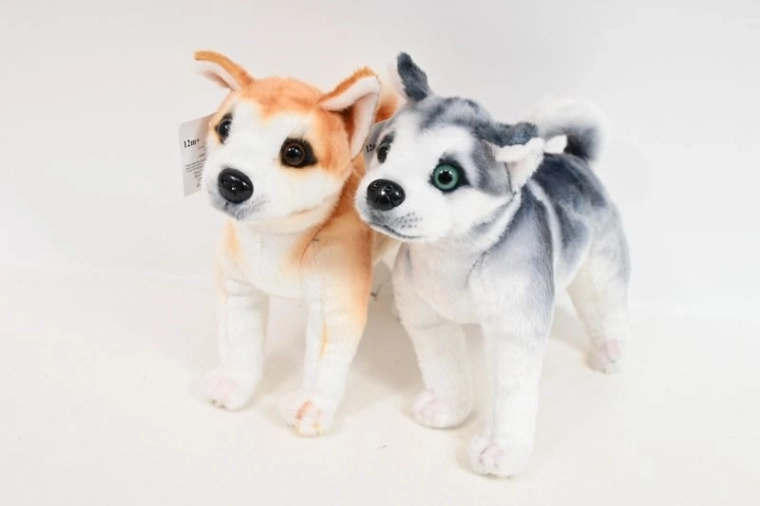 Pupazzo di peluche cane